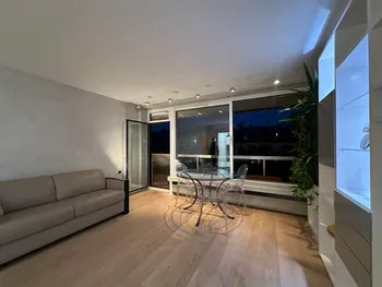 Living area with glass dining set