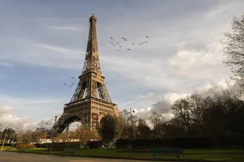 Eiffel tower view from park benches
